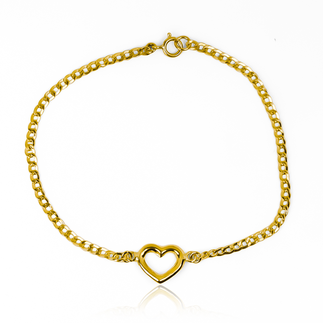 Luce elegante con nuestra Pulsera Cubana - Corazón JT de Oro 18K. Con un diseño exclusivo de Joyería Caracas, esta pulsera es garantía para toda la vida. Completa tu look con estilo y sofisticación.