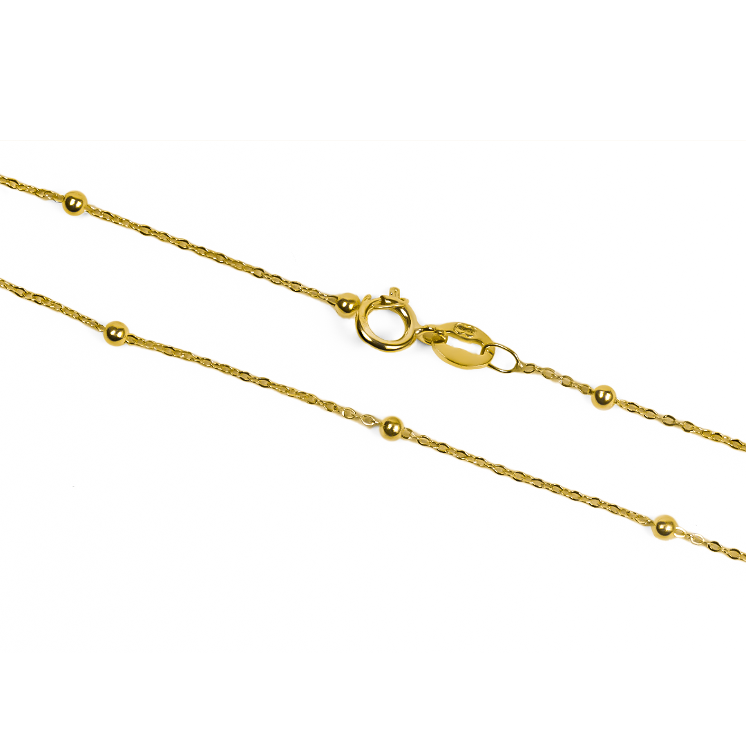 Lujo y elegancia se unen en nuestra Pulsera Esferas lisas I. Hecha de oro 18K por los expertos de Joyería Caracas, es el complemento perfecto para cualquier ocasión. Con garantía para toda la vida, esta pulsera es una inversión en calidad y estilo.