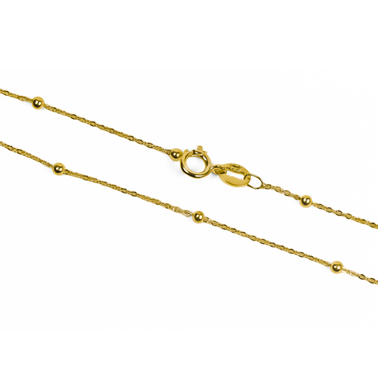 Lujo y elegancia se unen en nuestra Pulsera Esferas lisas I. Hecha de oro 18K por los expertos de Joyería Caracas, es el complemento perfecto para cualquier ocasión. Con garantía para toda la vida, esta pulsera es una inversión en calidad y estilo.