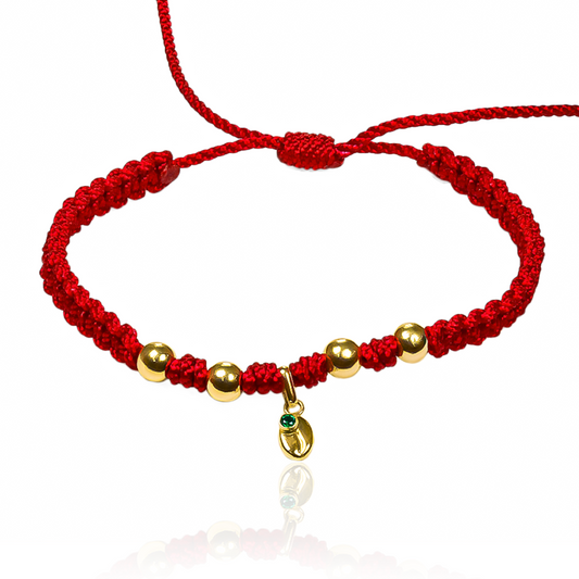 Esta elegante Pulsera Grano de café + Esferas #5 es una joya de Oro 18K de la exclusiva Joyería Caracas. Con garantía de por vida, esta pulsera es un símbolo de lujo y elegancia que perdurará para siempre. Añade un toque de sofisticación a tu estilo con esta pieza única.