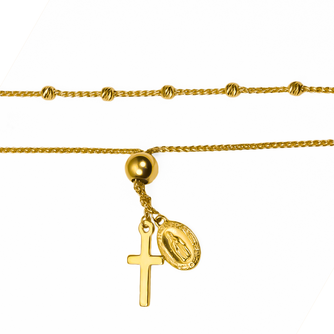 Descubre la belleza y protección de la Pulsera Guadalupe Cruz II. Hecha de Oro 18K por Joyería Caracas, esta pulsera es sinónimo de elegancia y calidad. Con su detalle de la cruz de Guadalupe, sentirás su protección en todo momento. ¡Con garantía para toda la vida, lleva esta pieza exclusiva contigo siempre!