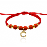 Descubre la elegancia y exclusividad con nuestra Pulsera Inicial Cristal + esferas lisas #4. Confeccionada en Oro 18K por Joyería Caracas, su estilo sofisticado y moderno se une a nuestra Garantía para toda la vida. Añade un toque de clase a cualquier look con este accesorio de calidad.