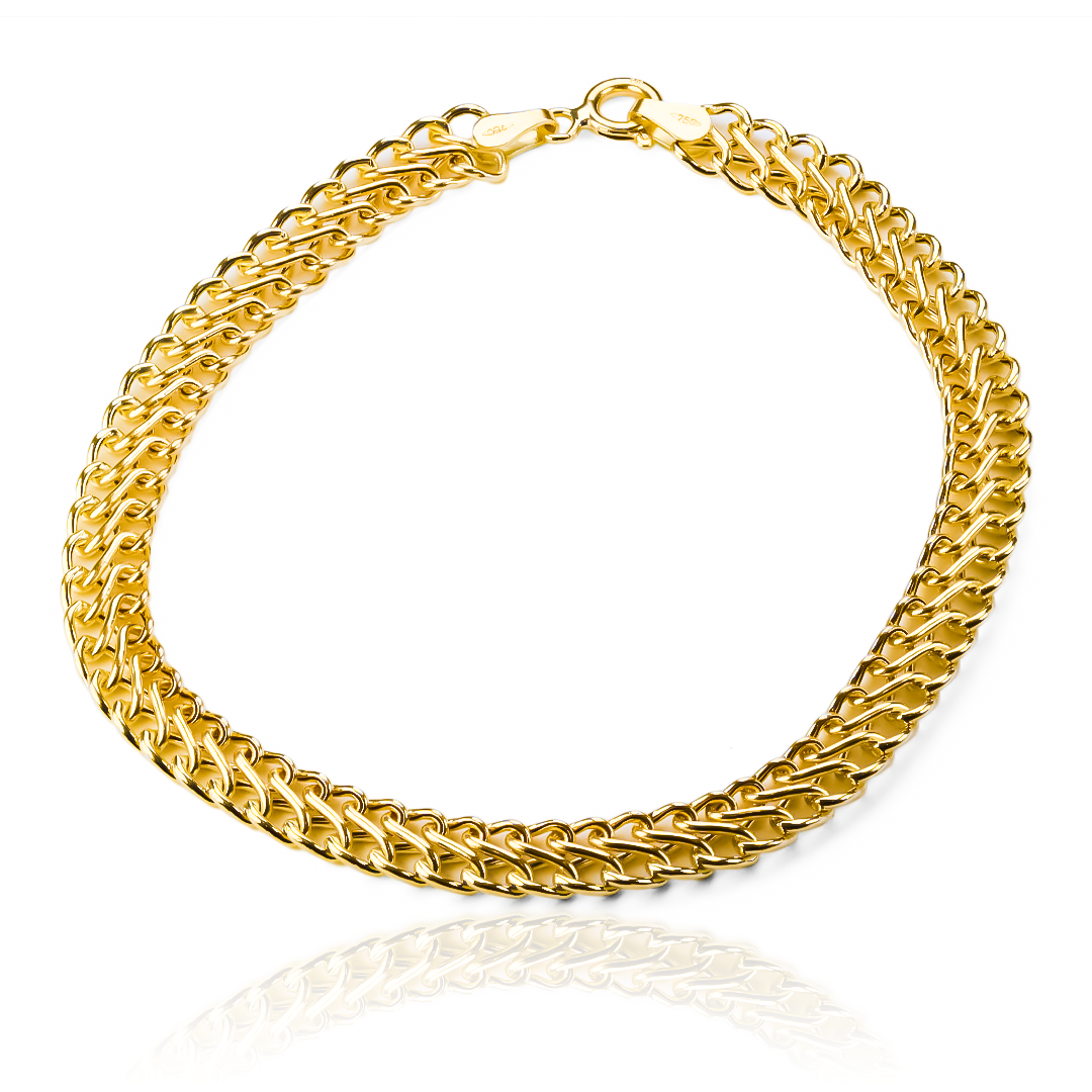 Descubre la elegancia y exclusividad de la Pulsera Saduza L I. Hecha de Oro 18K, esta joya de Joyería Caracas es una verdadera obra de arte. Con garantía para toda la vida, esta pulsera será el complemento perfecto para tus looks más sofisticados.