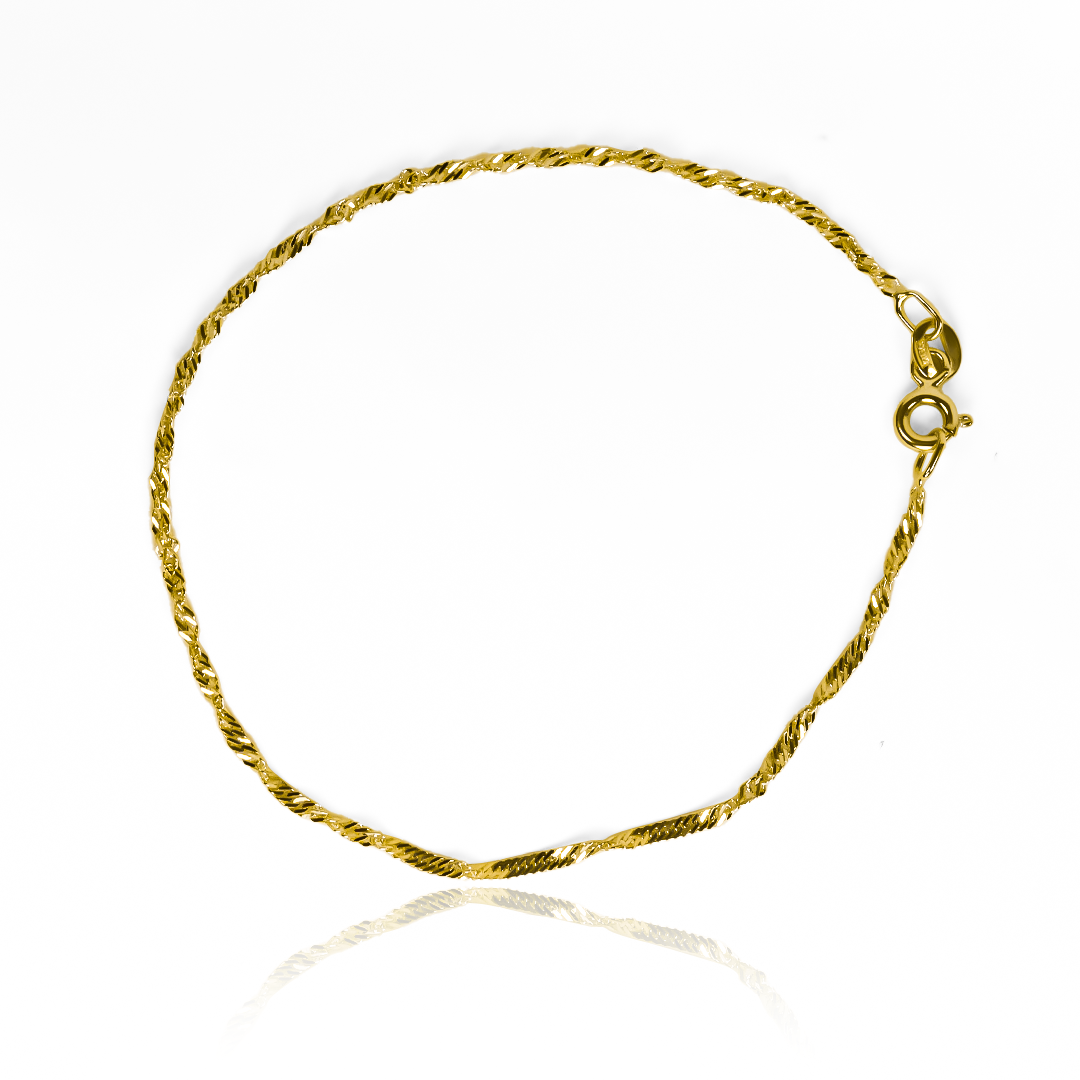 Descubre la elegancia de la Pulsera Singapur SI, una obra de arte de Joyería Caracas. Hecha de oro 18K y con una garantía de por vida, esta pulsera es un símbolo de lujo y estilo refinado. Llévala contigo y deslumbra en cualquier ocasión.