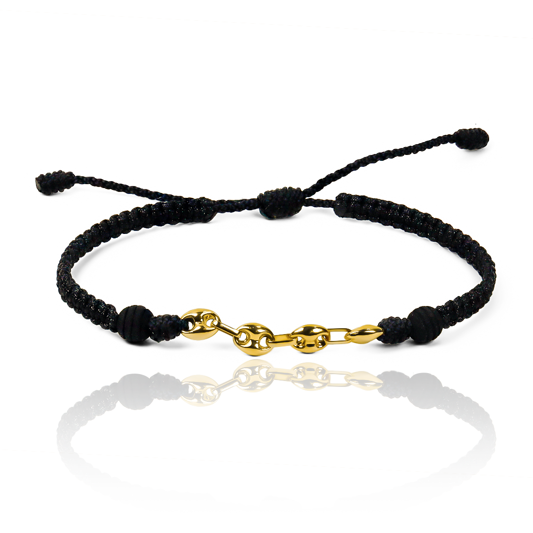 La Pulsera Calabrote - Tejida es una obra de arte en oro 18K de la prestigiosa Joyería Caracas. Hecha a mano con un diseño único, esta pulsera te brinda elegancia y exclusividad. Con garantía para toda la vida, es una inversión en estilo y calidad.