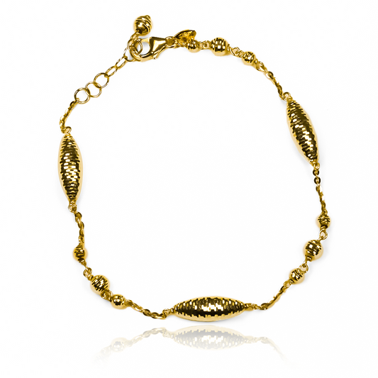 La pulsera Capullo I de Joyería Caracas es una verdadera obra de arte en oro 18K. Con un diseño elegante y exclusivo, esta pulsera te acompañará de por vida y será el complemento perfecto para cualquier ocasión. Garantizada para toda la vida, ¡una inversión que vale la pena!