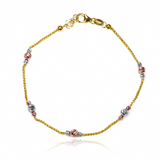 Descubre la elegancia y exclusividad de nuestra Pulsera cordón esferas facetadas 3 oros I. Hecha de oro 18K y creada por Joyería Caracas, esta pulsera te ofrece garantía para toda la vida. Luce sofisticada y resalta en cualquier ocasión con esta hermosa pieza de joyería.