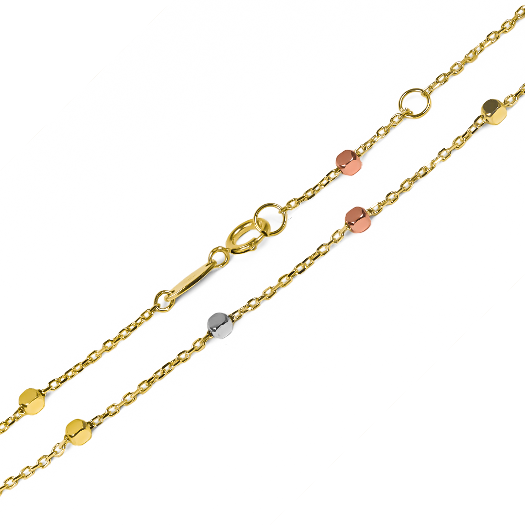 Disfruta del lujo y la exclusividad con nuestra Pulsera dados 3 oros I. Realizada en oro 18K por Joyería Caracas, esta pulsera ofrece una garantía de por vida. Una pieza de joyería que refleja elegancia y calidad para siempre.