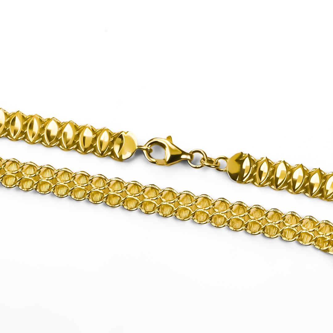 Pulsera doble faz hojas I de Joyería Caracas en Oro 18K. Una pieza exclusiva y atemporal que resalta la elegancia y el estilo de quien la use. Con garantía para toda la vida, esta pulsera es una inversión en belleza y calidad que perdurará por siempre.