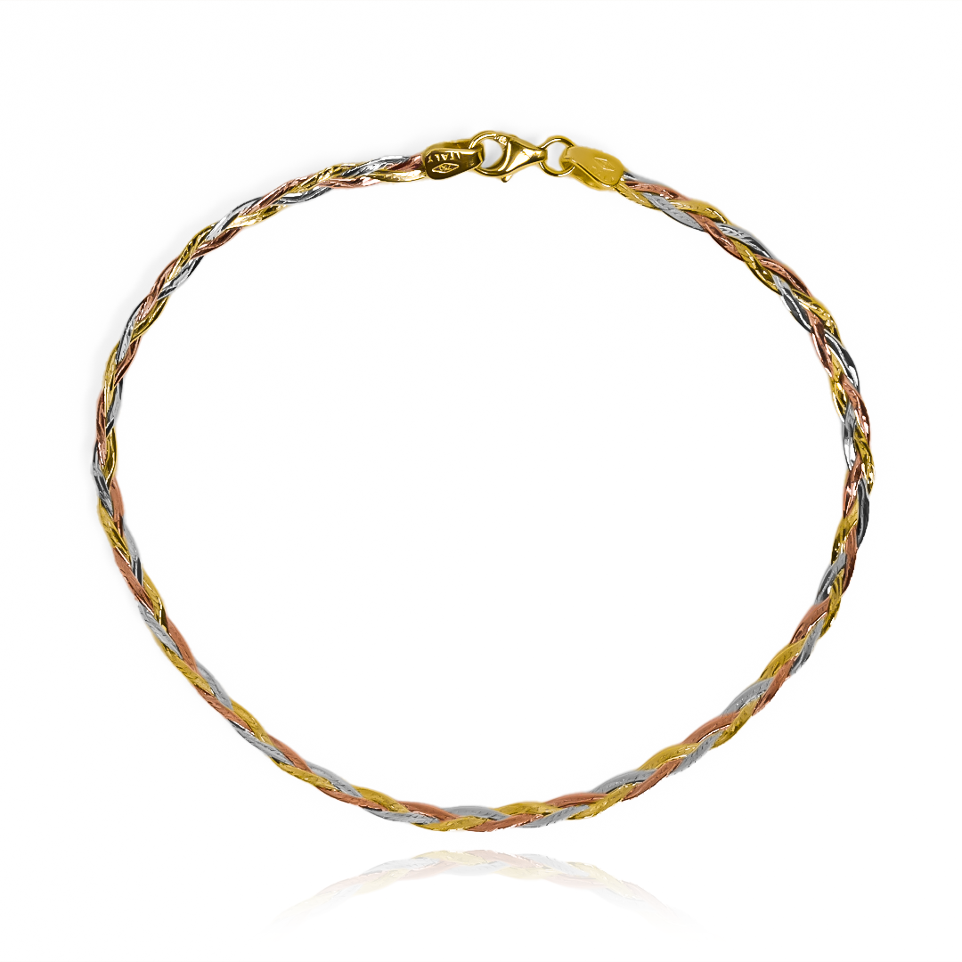 Discreta, elegante y exclusiva; la pulsera trenza 3 oros I es una verdadera joya de oro 18K de la reconocida Joyería Caracas. Con una garantía de por vida, esta pulsera es sinónimo de calidad y durabilidad. Realza tu estilo con esta pieza única y sofisticada.