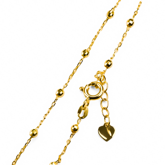 Descubre la elegancia y la exclusividad con nuestra pulsera de esferas facetadas en oro 18K. Cada pieza es una verdadera obra de arte de Joyería Caracas, con garantía para toda la vida. Añade un toque de lujo a tu estilo con esta pulsera única.