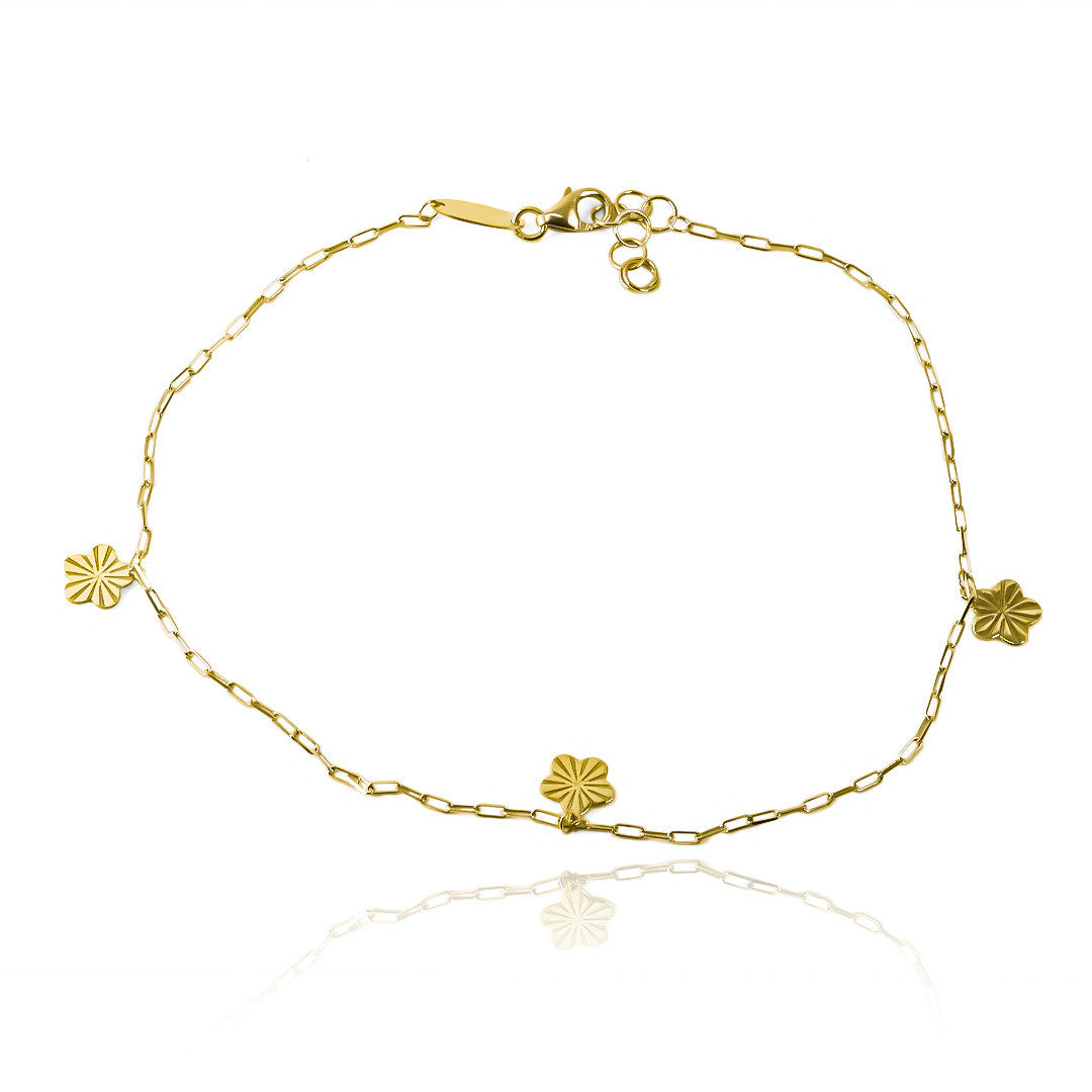 Siente la elegancia y exclusividad con nuestra hermosa Tobillera Clip Flores. Hecha con oro 18K y garantizada de por vida por Joyería Caracas. Una joya que representa la belleza y durabilidad en un solo producto. ¡Añade un toque de sofisticación a tu outfit con esta tobillera única!