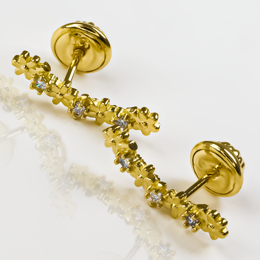 Descubre el encanto de Topitos Caterpillar flower cristal, una joya exclusiva de Oro18K que te garantiza elegancia y sofisticación. Disfruta de su belleza atemporal gracias a la calidad de Joyería Caracas y la garantía para toda la vida. Una pieza de arte para lucir con estilo y distinción.