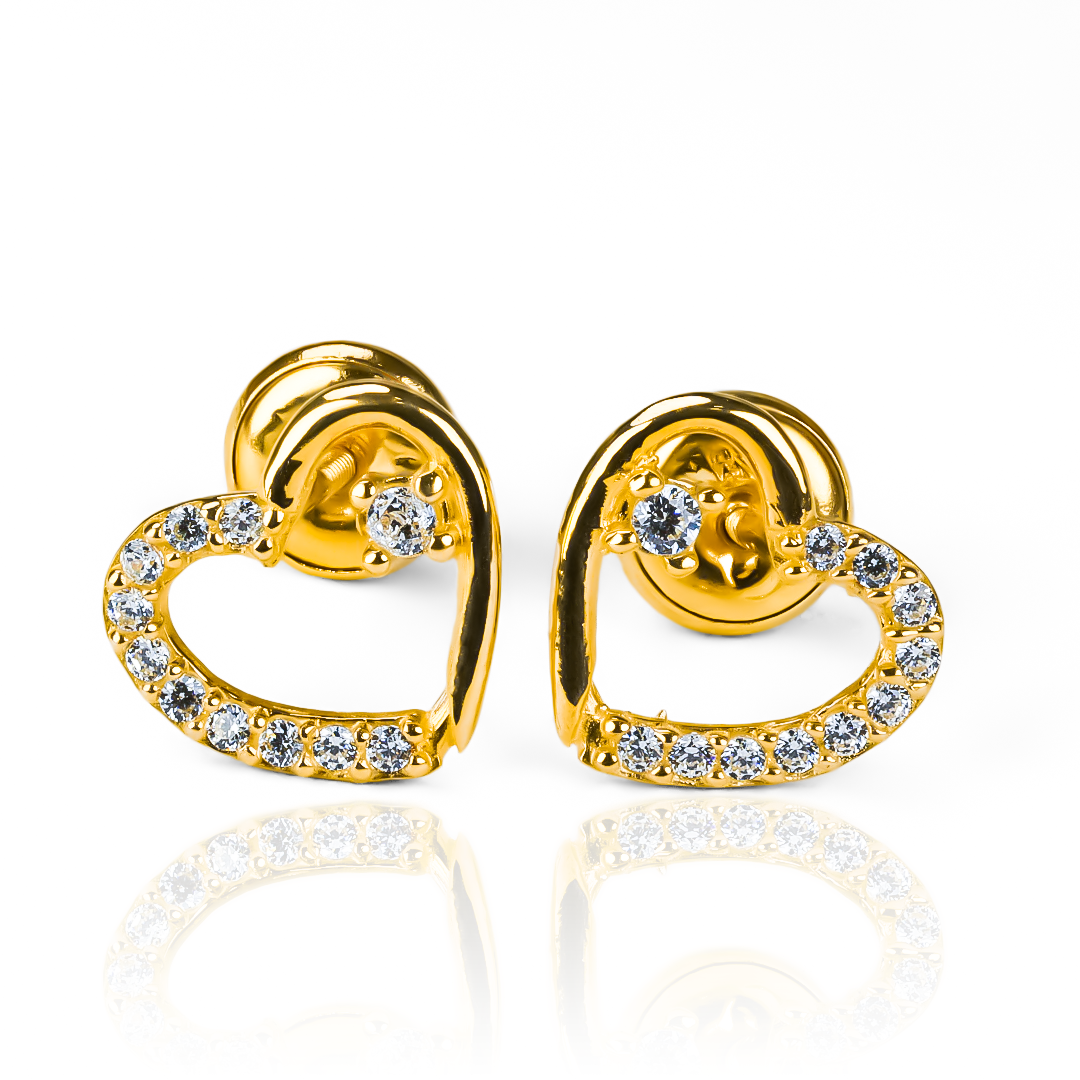 Disfruta de la elegancia y exclusividad con los Topitos Corazón de Cristal JT. Hechos con oro 18K y elaborados por Joyería Caracas, estos topitos son la pieza perfecta para cualquier ocasión. Con garantía para toda la vida, podrás lucirlos con orgullo y estilo.