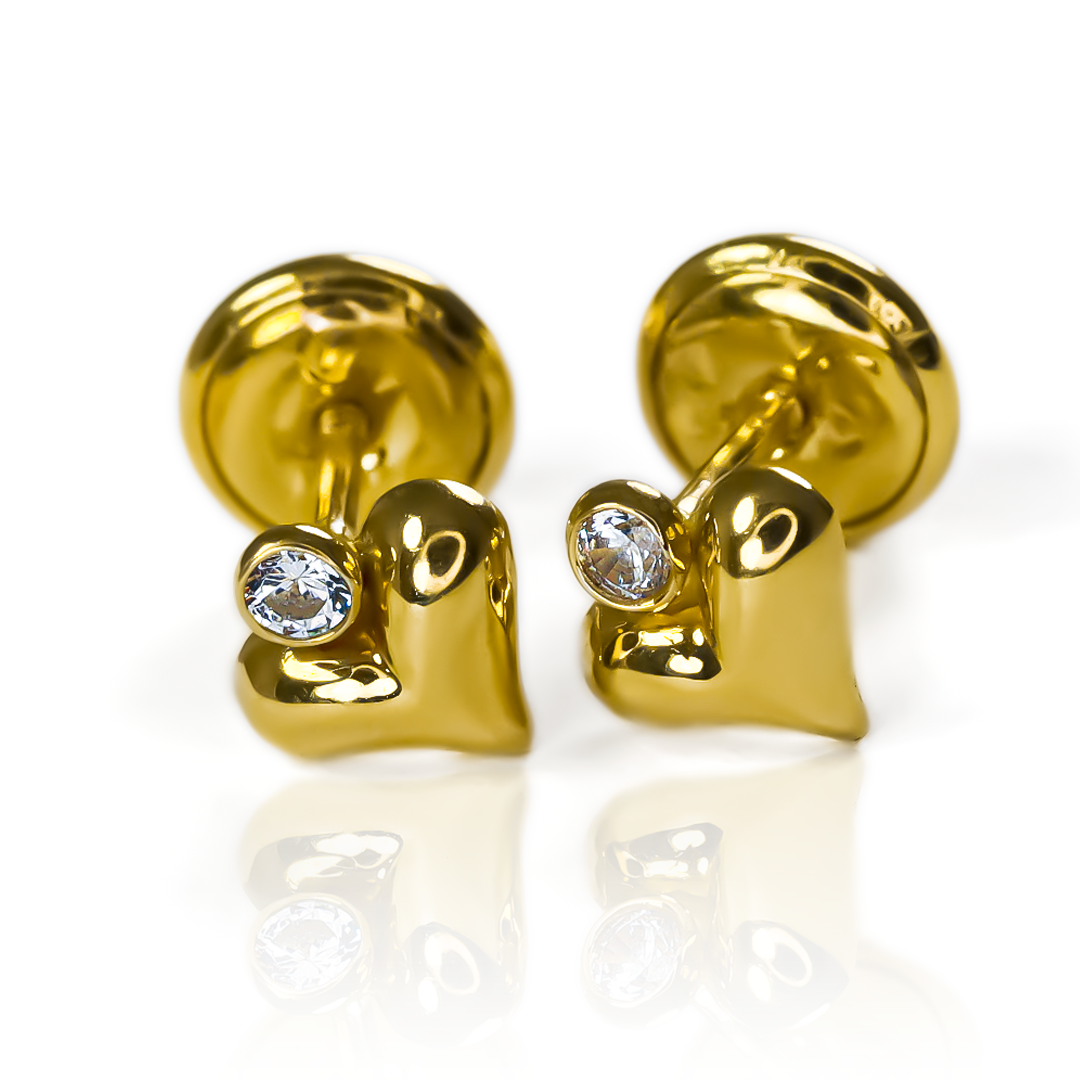 Viste con estilo y elegancia con nuestros Topitos Corazón de cristal de oro 18K de Joyería Caracas. Con su estilo mini y su garantía para toda la vida, estas piezas son perfectas para añadir un toque exclusivo y sofisticado a cualquier atuendo. Haz una declaración de lujo con estos topitos.