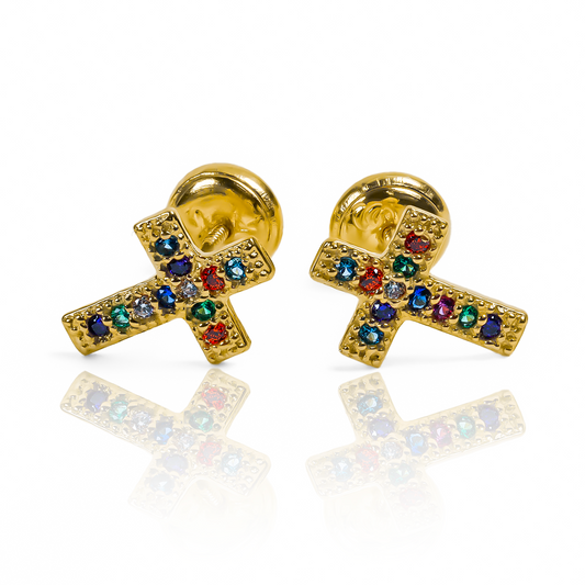 Descubre la belleza y elegancia de los Topitos Cruz multicolor de Joyería Caracas. Hechos con oro de 18K, estos topitos son una obra de arte que añadirán un toque de lujo a tu estilo. Con garantía para toda la vida, es una inversión en calidad y exclusividad.