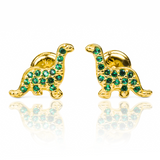 Con estos Topitos Dinosaurios Green de oro de 18K podrás llevar contigo un pedacito de la exclusiva joyería Caracas. Con su garantía para toda la vida, podrás lucir estos elegantes y sofisticados topitos en cualquier ocasión. Haz una declaración de estilo y sofisticación con esta pieza única.