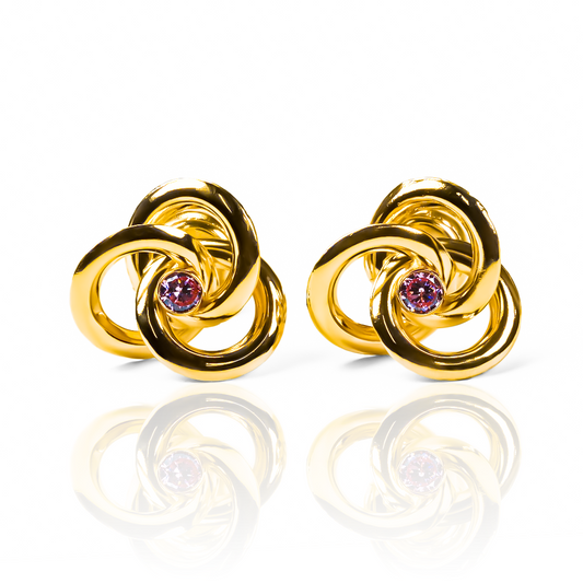 Elegancia y lujo se unen en nuestros Topitos Espiral L cristal pink. Con detalles en oro 18K y garantía de por vida, esta joya de Joyería Caracas es una adición imprescindible a cualquier colección de joyas de alta calidad. Disfruta de su exclusividad y brillo duradero.