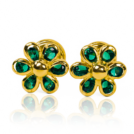 Los Topitos Flor de cristal tienen un toque exclusivo con sus 6 pétalos en un verde vibrante. Hechos con oro 18K de Joyería Caracas y garantizados para toda la vida, son una joya que trasciende el tiempo. Añada un toque de elegancia y lujo a su colección con estos topitos florales.