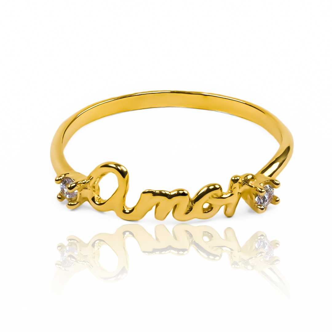  anillo amor JT. Hecho de oro 18k y con nuestra garantía de por vida, esta joya de Joyería Caracas representa amor eterno y calidad excepcional. 