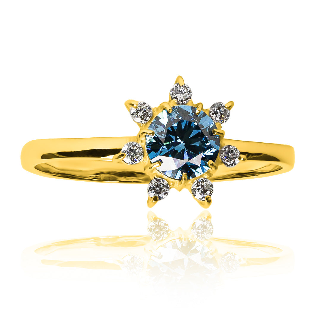  anillo de compromiso blue flower, hecho con el más fino oro 18 k de Joyería Caracas. Este exquisito anillo cuenta con un certificado de calidad y garantía de por vida, asegurando su belleza y durabilidad. 