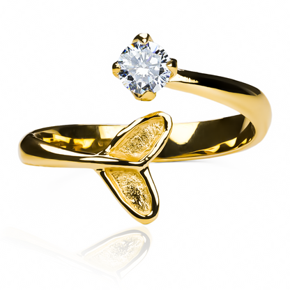 anillo dolphin crystal de joyería caracas es una pieza de lujo en oro 18k que te garantiza elegancia y exclusividad. Cada detalle de su diseño evoca la gracia y el encanto del delfín, símbolo de la felicidad y el amor en la mitología. Con garantía de por vida