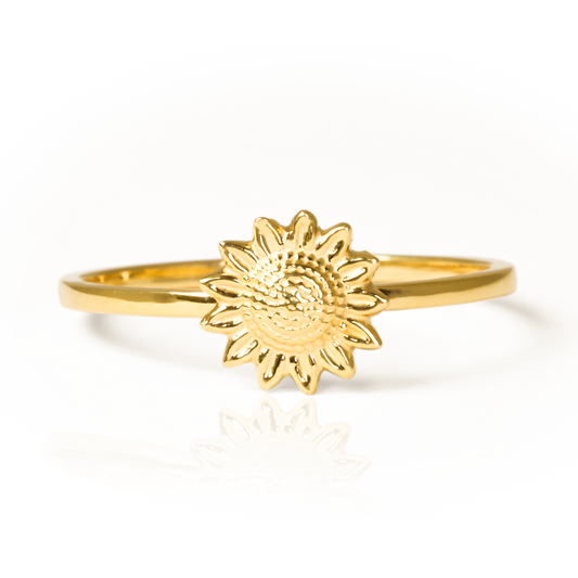 anillo girasol S de joyería Caracas está hecho de oro 18k, lo que le aporta una durabilidad y elegancia incomparables. Con su diseño de girasol, la flor que simboliza la felicidad y la prosperidad