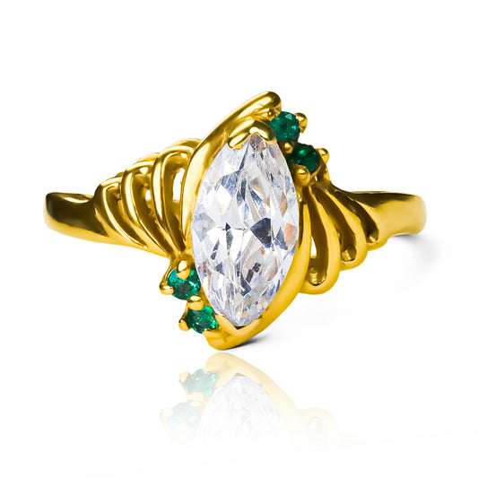 Anillo Marquise Esmeraldas de joyería caracas. Fabricado en oro 18k, cuenta con acabados de lujo y un diseño exclusivo en forma de marquesa con brillantes esmeraldas. Con garantía para toda la vida