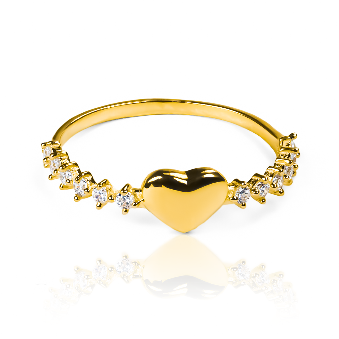 anillo de oro 18k de joyería Caracas es un verdadero símbolo de pasión y compromiso. Su diseño elegante y exclusivo, con un corazón apasionado grabado