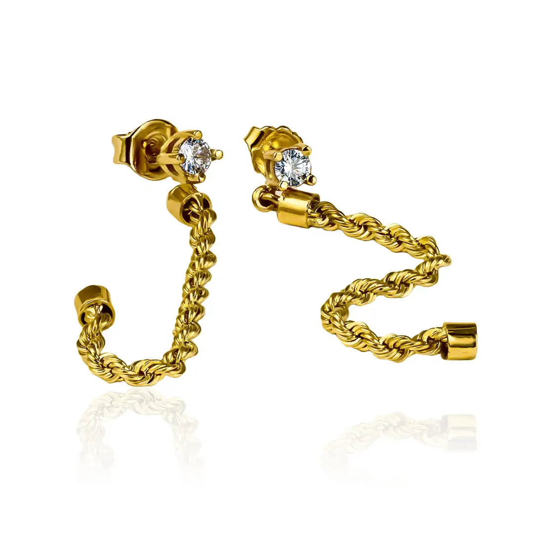 Descubre la elegancia y el brillo de los Aretes Cristal Lazo II. Hechos de Oro 18K y creados por Joyería Caracas, estos aretes son la esencia del lujo y la exclusividad. Con garantía para toda la vida, son una adición valiosa a tu colección de joyas