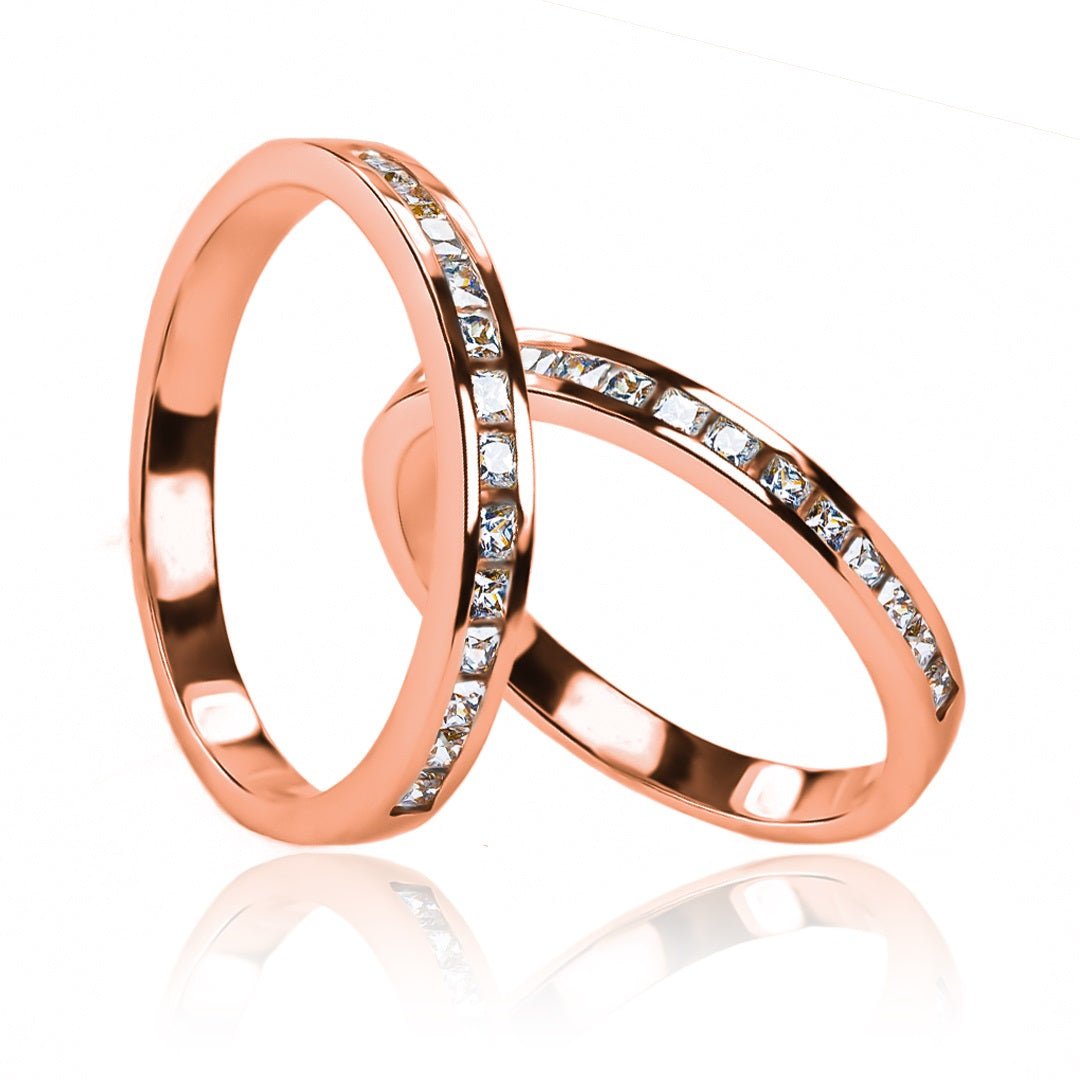 anillos de boda Cristal Sin Fin! Estas impresionantes piezas son el complemento perfecto para ese gran día, con un diseño moderno y sofisticado que simboliza la unión eterna. Fabricados en nuestra joyería Caracas, con oro de 18 k y certificado de calidad