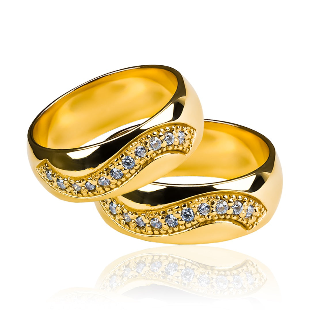 argollas de matrimonio "Curve Love" en nuestra joyería de oro de 18k en Caracas. Cada par de anillos está cuidadosamente elaborado en oro de 18 quilates y cuenta con un certificado de calidad