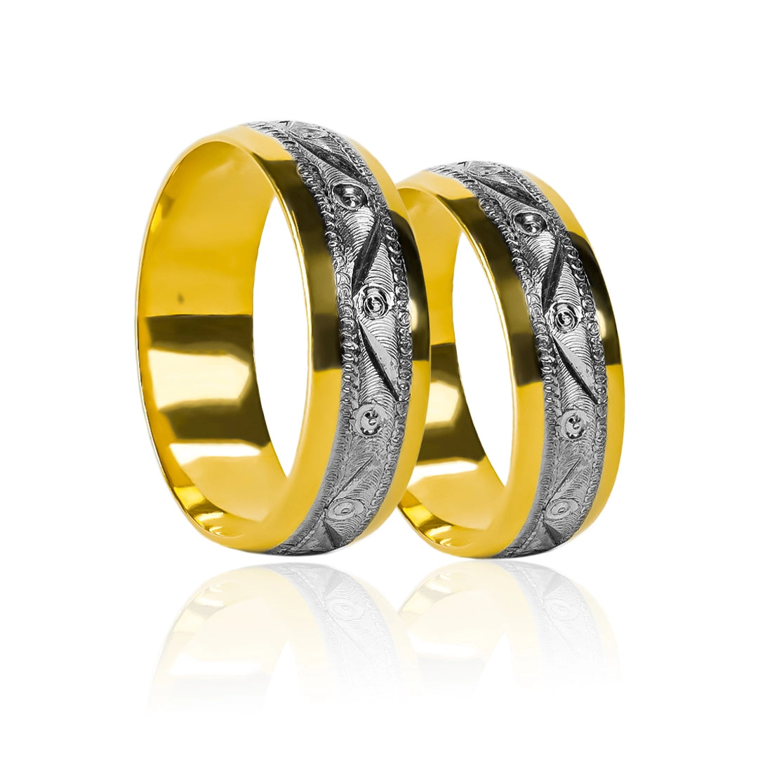 Two-tone faceted wedding rings