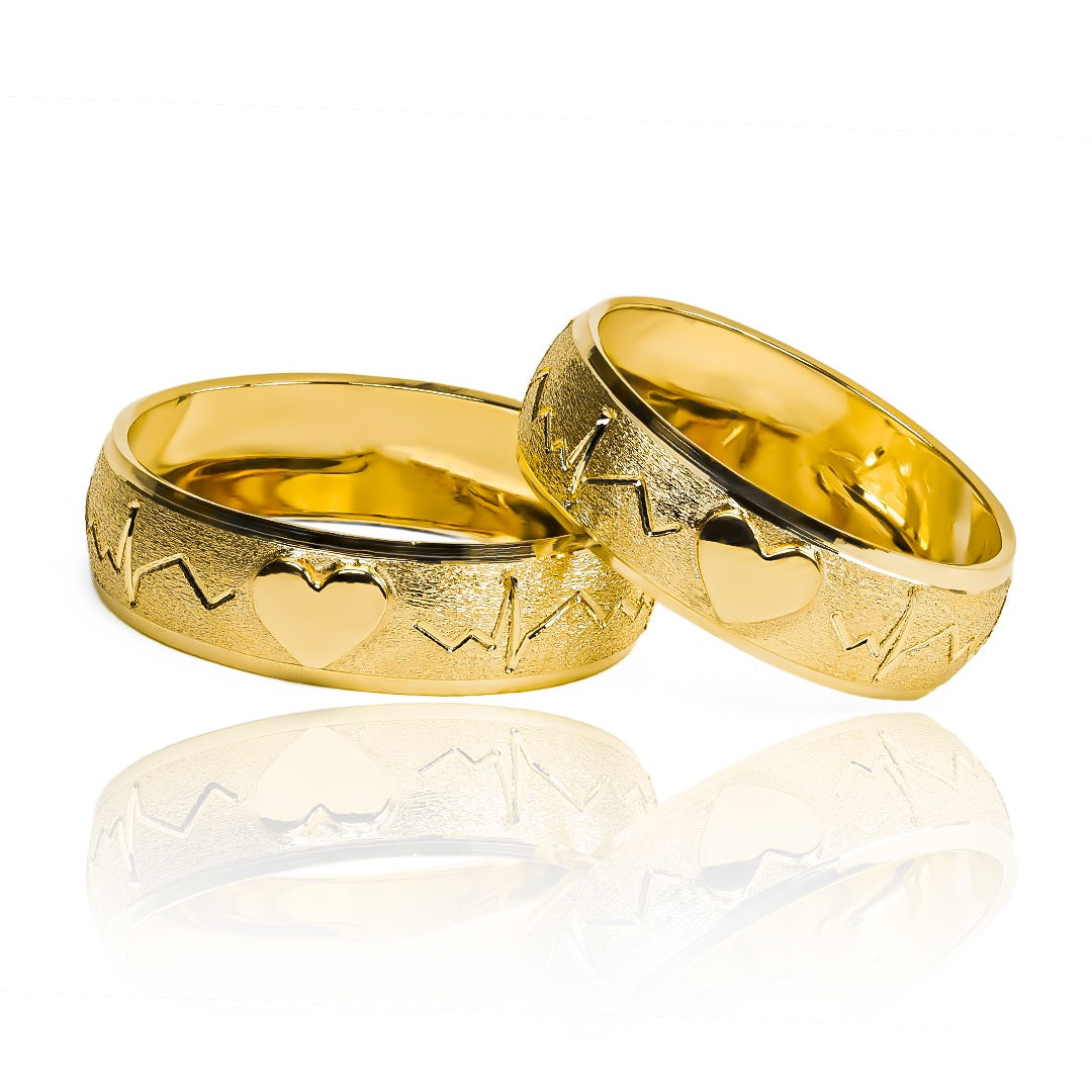 anillos de bodas latidos iniciales &amp; corazones! Fabricados en nuestra joyería de oro de 18k en Joyería Caracas, cada anillo viene con un certificado de calidad y garantía para toda la vida