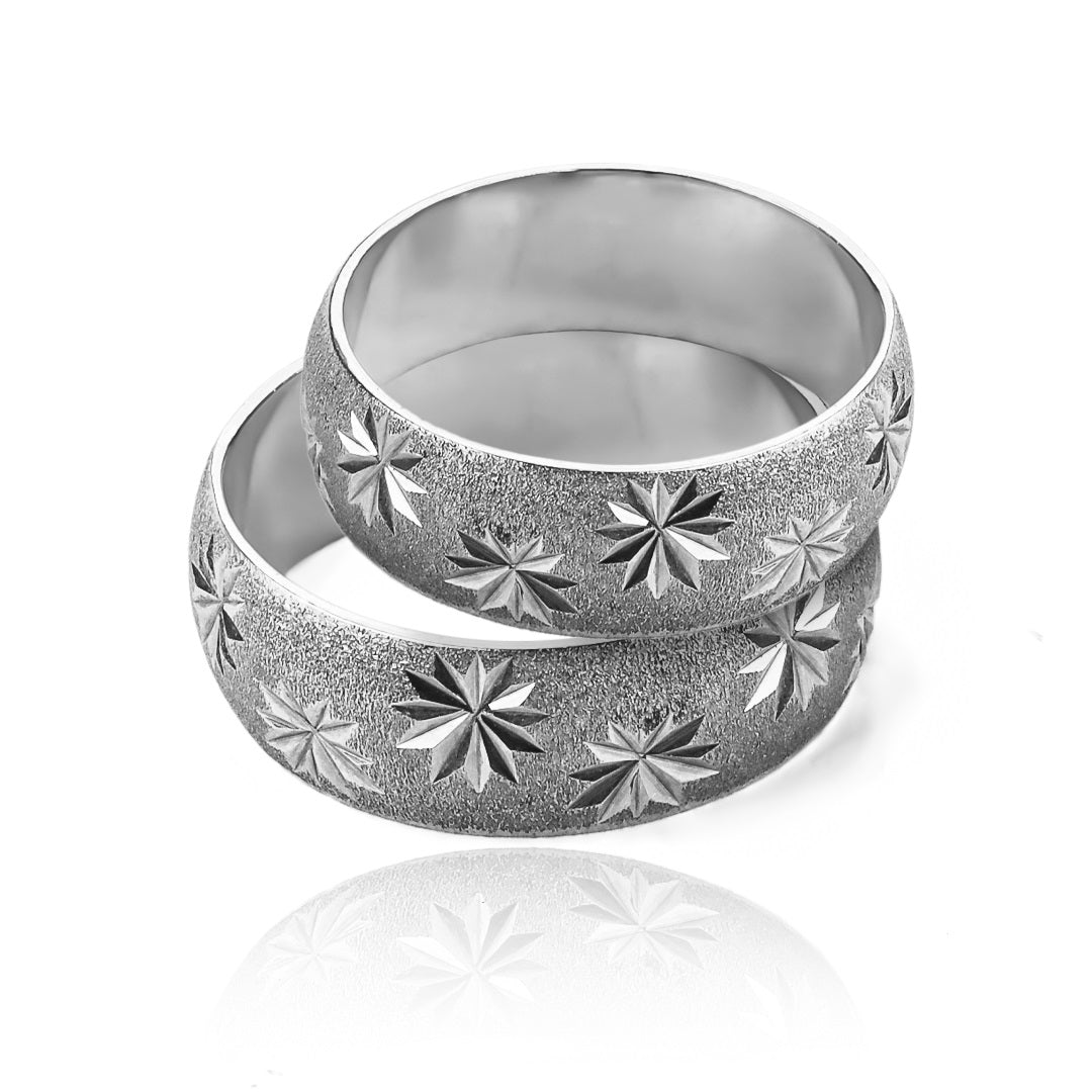 anillos de bodas Noche Estrellada de Joyería Caracas, fabricados en oro de 18 quilates con certificado de calidad y garantía para toda la vida.