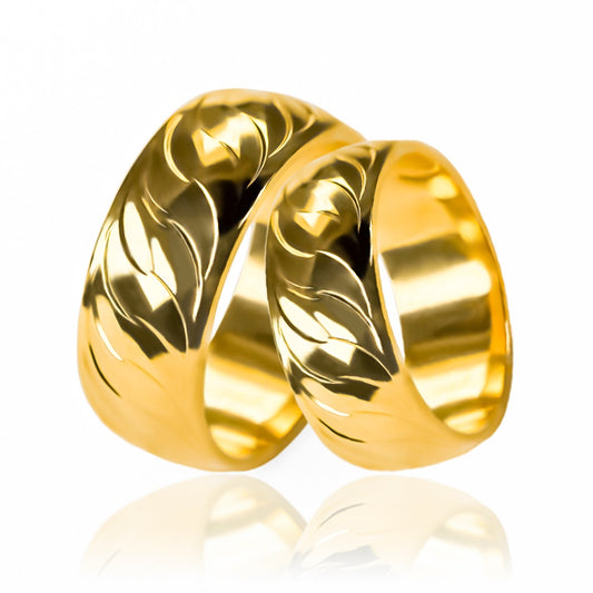 Argollas de Matrimonio Shine Esse, elaboradas con oro de 18 quilates, brindando un brillo y elegancia excepcional. Cada anillo viene con un certificado de calidad que garantiza la autenticidad del oro y la durabilidad de la pieza. 