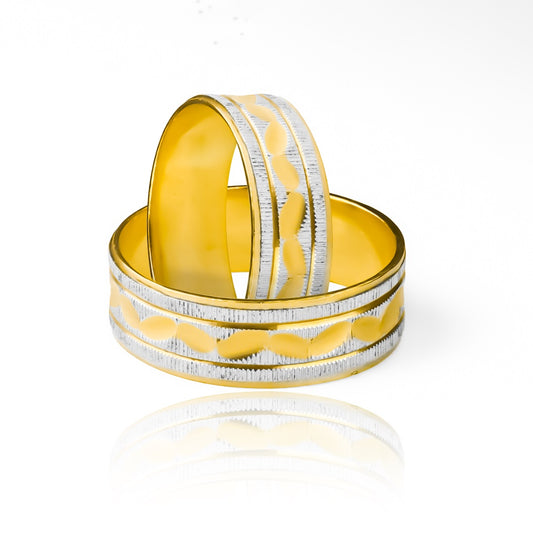 anillos de boda de oro de 18k de la Joyería Caracas! Cada anillo está cuidadosamente diseñado con un elegante diseño de serpiente rodio que simboliza la eternidad y la conexión duradera entre dos almas gemelas. Además, cada anillo viene con un certificado de calidad y garantía para toda la vida