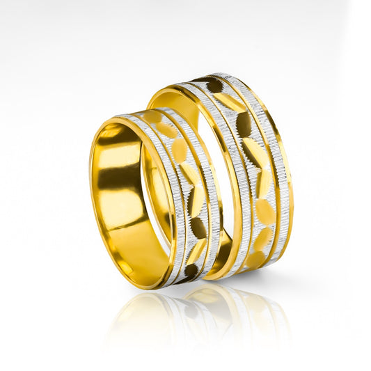 anillos de boda de oro de 18k de la Joyería Caracas! Cada anillo está cuidadosamente diseñado con un elegante diseño de serpiente rodio que simboliza la eternidad y la conexión duradera entre dos almas gemelas. Además, cada anillo viene con un certificado de calidad y garantía para toda la vida