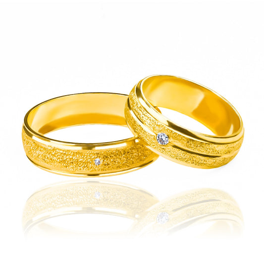 Argollas de matrimonio Street Love de Joyería Caracas! Estas hermosas argollas están elaboradas en oro de 18k, con un certificado de calidad que garantiza su autenticidad y durabilidad para toda la vida