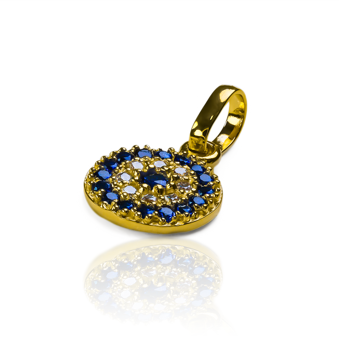 Descubre la elegancia exclusiva de nuestro Dije Mandala Cristal blue, elaborado en oro 18K por Joyería Caracas. Con garantía para toda la vida, este dije es una pieza atemporal y sofisticada que te acompañará siempre. Una joya perfecta para reflejar tu estilo sutil y refinado.