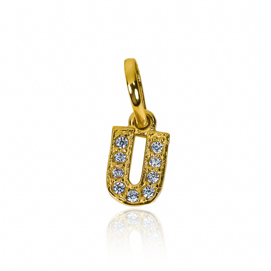 Luce un estilo de lujo con nuestro Dije Letra U crystal mini JT en oro 18K de Joyería Caracas. No solo es una hermosa pieza para complementar tu estilo, sino que también viene con garantía para toda la vida. Dale un toque de exclusividad a tu joyero con este dije único.