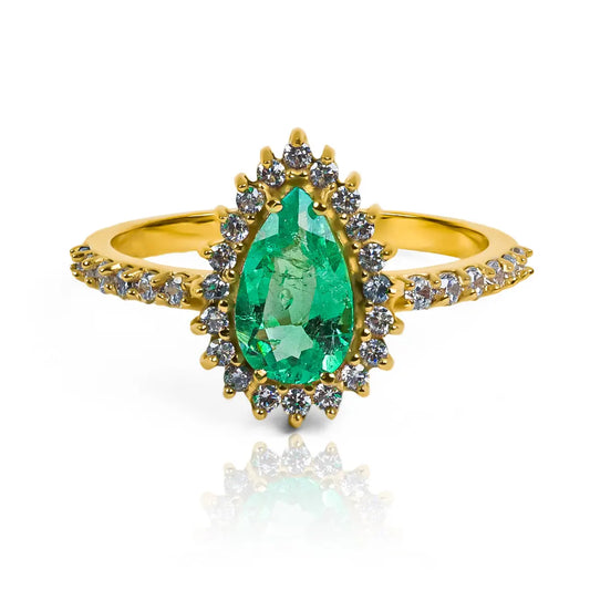 Anillo de compromiso emerald drop, una pieza única de Joyería Caracas en oro 18k con certificado y garantía de por vida.