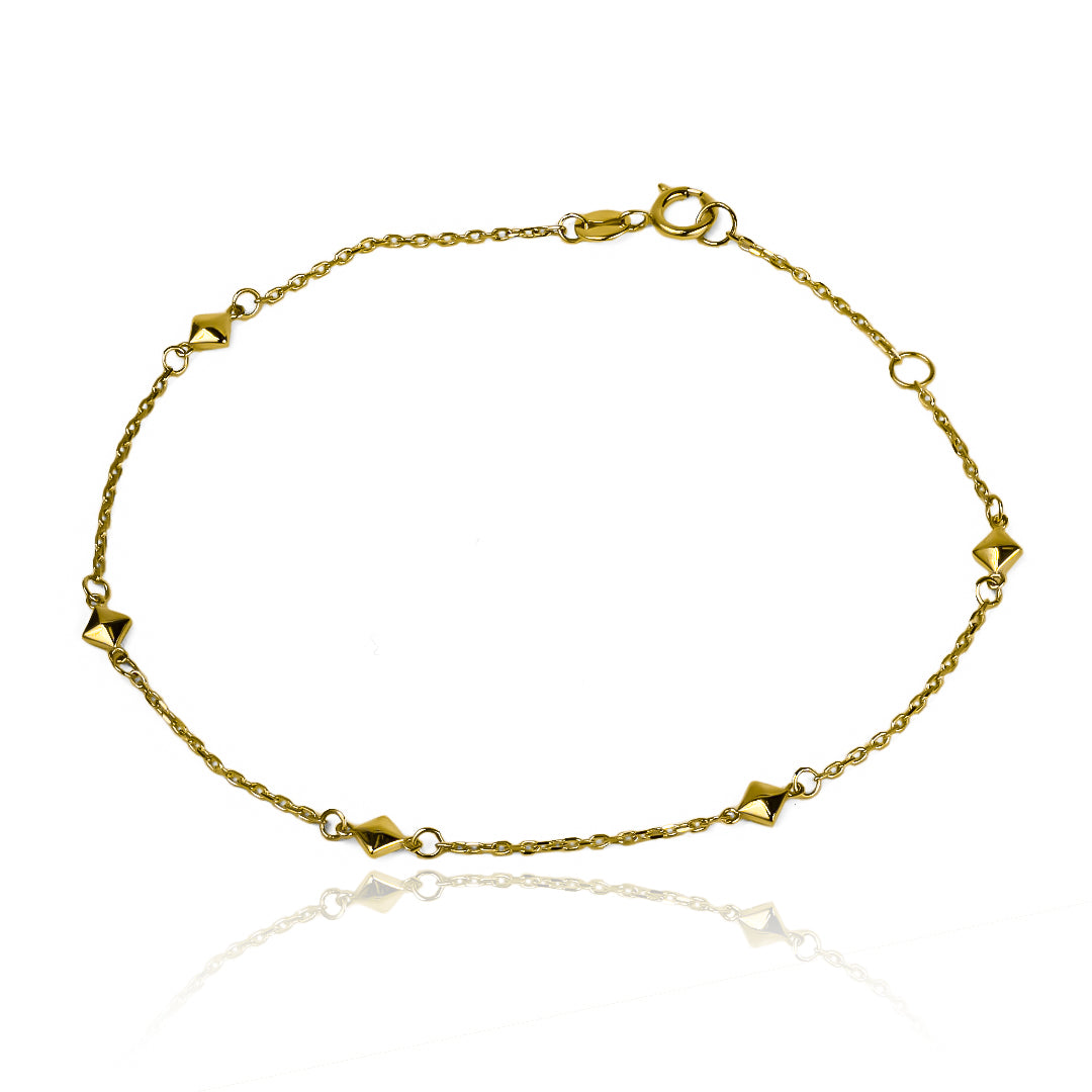 Elegante y exclusiva pulsera con diseño de rombos, hecha con oro de 18K de alta calidad. De la prestigiosa joyería Caracas con garantía de por vida. Un accesorio que te acompañará siempre con clase y estilo.