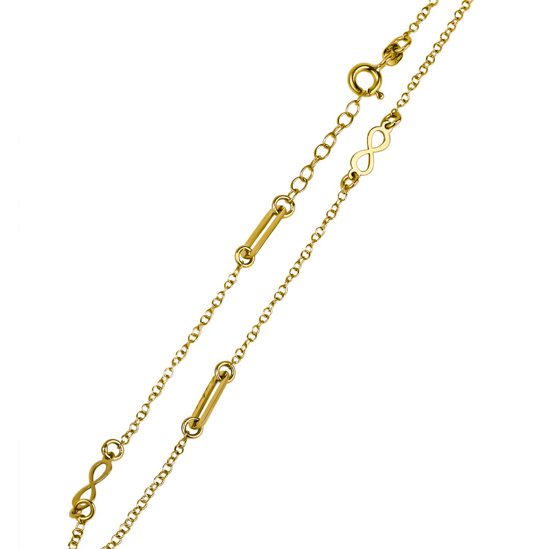 Luce elegante con la tobillera infinito clip, hecha de oro 18K de la exclusiva Joyería Caracas. Con un diseño único e infinito, esta tobillera es garantía de durabilidad para toda la vida. Complementa tu estilo con esta pieza de lujo y sofisticación.